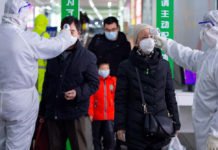 China eleva a 2.442 los muertos y a 76.936 los infectados por el coronavirus