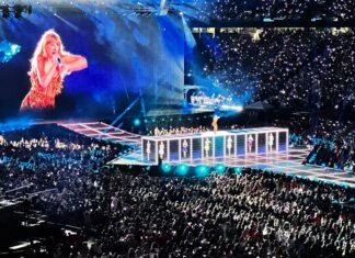 Taylor Swift revoluciona las redes sociales con el videoclip de ‘Opalite’ y su desfile de celebrities a crowd of people watching a woman on a stage