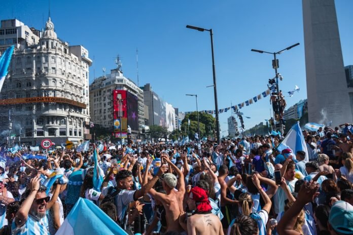 image_1770991226533 Argentinians celebrate in a bustling city square.