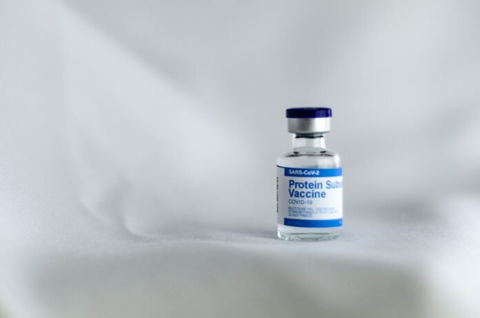 image_1771426827382 white and yellow labeled bottle