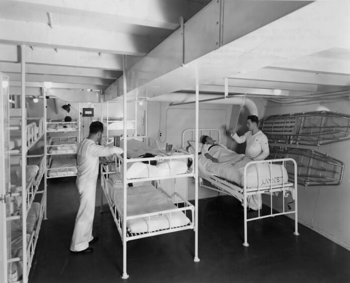 image_1771531230503 Medical ward with bunk beds and patients