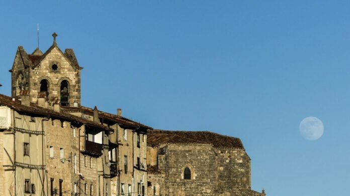 A large building with a clock tower on top of it