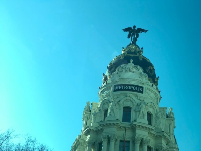 a building with a statue on top of it