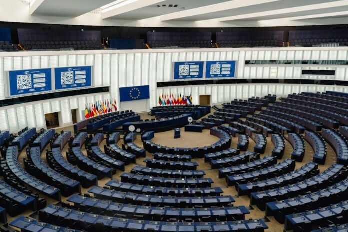 image_1774620027138 Modern parliamentary chamber with tiered seating