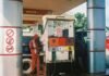 El fraude en combustibles: una modalidad delictiva en auge que amenaza al sector energético español man in red and black plaid dress shirt standing near gas pump