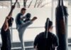 La nueva generación del kickboxing español conquista Argentina: análisis del fenómeno Álex Usieto a group of people in a gym with punching gloves