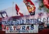 La batalla regulatoria por los alquileres: entre la presión gubernamental y la resistencia del sector inmobiliario Fans wave flags and banners at a sporting event.