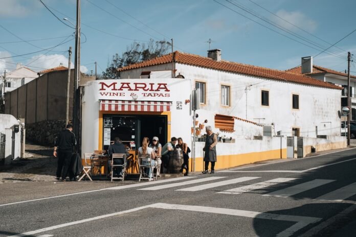 People sitting outside a wine and tapas bar