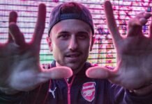 Arsenal vs Atlético de Madrid: Todo lo que necesitas saber sobre la vuelta de semifinales de Champions League man wearing black and red Puma zip-up jacket