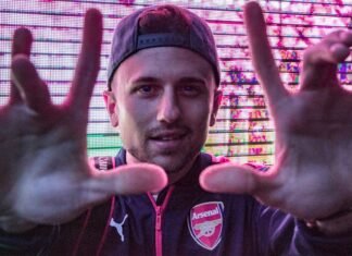 Arsenal vs Atlético de Madrid: Todo lo que necesitas saber sobre la vuelta de semifinales de Champions League man wearing black and red Puma zip-up jacket