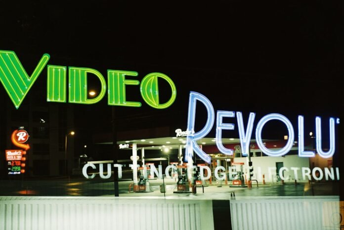 a neon sign that reads video revolu
