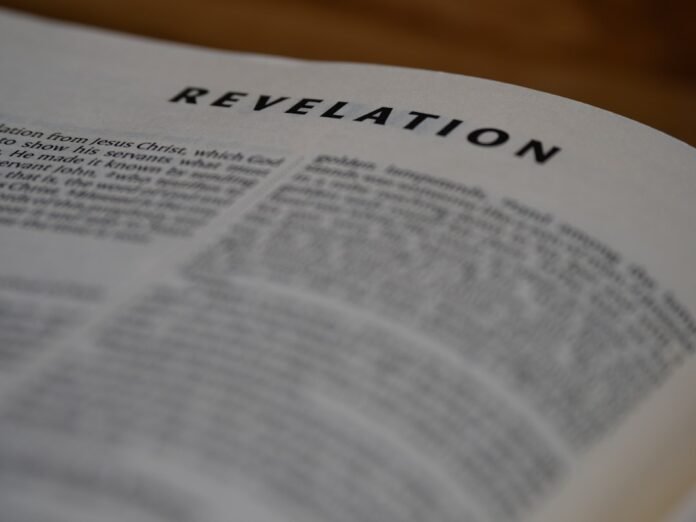 A bible page showing the book of revelation.