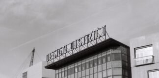 El resurgir de Isco en el Betis: cuando la calidad marca la diferencia en el momento crucial a black and white photo of a building with a sign on top