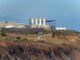 La industria nuclear española enfrenta una paradoja: oportunidades crecientes con talento menguante green truck running near plantation building