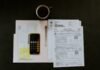 Los controles fiscales en operaciones de efectivo: qué necesitas saber en 2024 black Android smartphone near ballpoint pen, tax withholding certificate on top of white folder