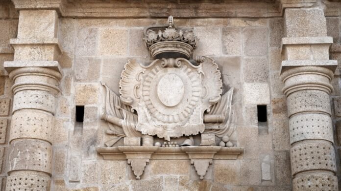 Stone relief of a coat of arms with a crown