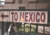 España y México fortalecen alianza comercial con ambiciosa meta de duplicar intercambios para 2030 a close up of a street sign with a building in the background