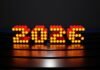 El Eclipse Solar de 2026: Un Fenómeno Astronómico Único que Transformará España en Destino Mundial de Observación Glowing 2026 numbers on a dark reflective surface.