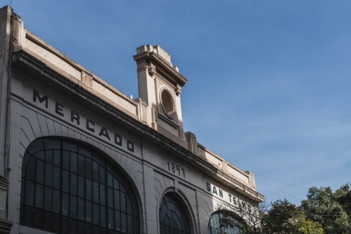 Mercado building facade with large arched windows