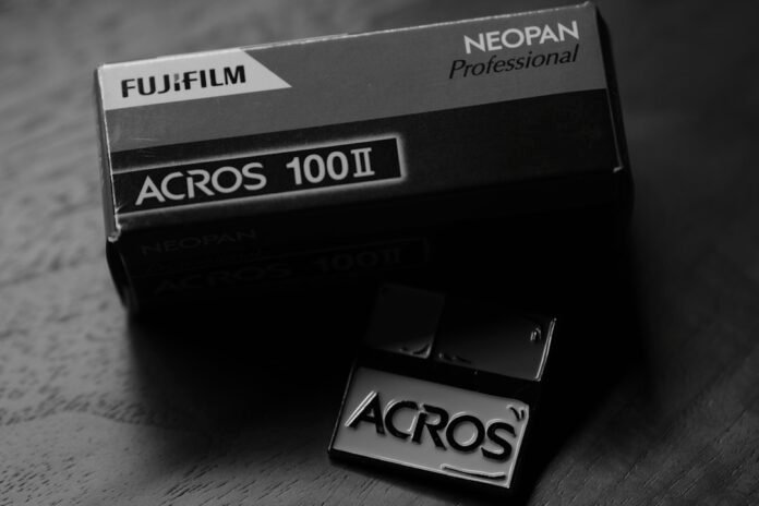 a black and white photo of a box of acros