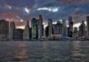 Teletrabajo en verano: Las ciudades españolas que conquistan a los nómadas digitales en 2024 city skyline across body of water during daytime