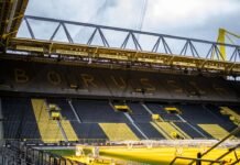 Borussia Dortmund apuesta por la cantera joven: el relevo de Adeyemi y la filosofía del Signal Iduna Park a stadium filled with lots of yellow seats