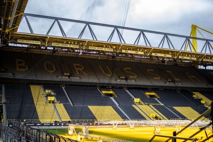 a stadium filled with lots of yellow seats