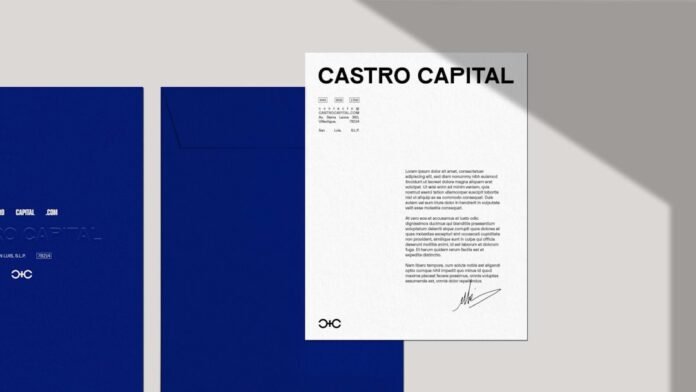 image_1785384039002 a blue book with a black and white logo on it
