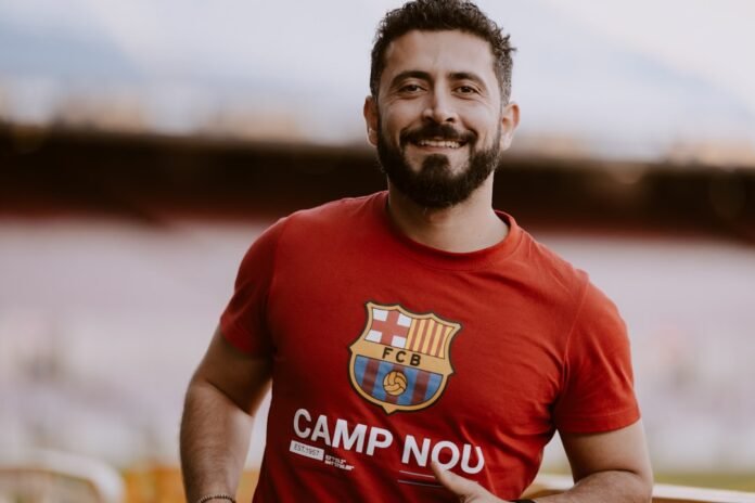 image_1786291237437 a man wearing a red shirt
