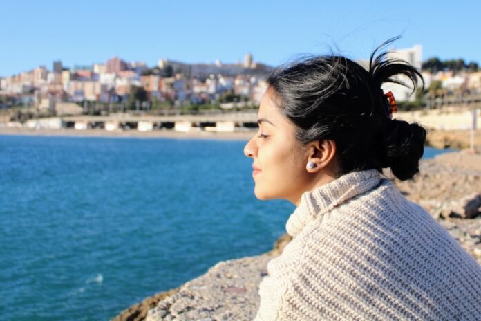 A woman looking out over a body of water