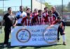 Athletic Club cierra su mercado de salidas con Agirrezabala como última baja: el equipo toma forma definitiva A group of men in soccer uniforms holding a banner on a sports field.