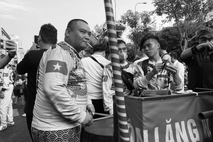 A black and white photo of a group of people