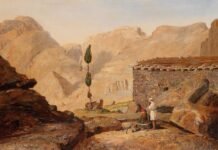Guillermo Lorca: El pintor chileno que conquista Europa con su universo de niñas, bestias y magia oscura Two figures near stone building in rocky desert landscape