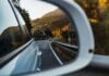 El espejo europeo: por qué viajar a Francia nos hace reflexionar sobre la riqueza y el nivel de vida en España black vehicle reflecting on side mirror