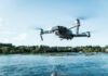 Pilotos de Drones: La Profesión del Futuro que ya Demanda el Mercado Laboral Español black DJI Mavi quadcopter near body of water