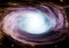 Fronteras del Cosmos y la Mente: De Magnetares a Pollitos, la Ciencia que Redefine Nuestra Comprensión del Universo A vibrant, swirling galaxy with a bright center