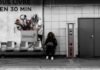 Glovo ante una posible reconquista: Los fundadores estudian recuperar el control de su propia empresa woman in black jacket standing beside white wall