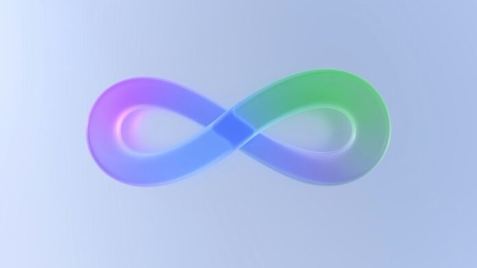 A colorful infinity symbol on a gradient background