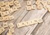 Letras del Tesoro: El Refugio Financiero que Conquista a Familias y Empresas Españolas en Tiempos de Inflación scrabble tiles spelling the word latin on a wooden surface