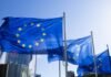 La industria de defensa europea ante su mayor desafío: unificar criterios para competir con las potencias mundiales blue and yellow flag on pole