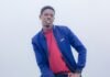 Arouna Sangante: El sueño aplazado de debutar con Senegal mientras consolida su rol en el Sevilla FC man in red turtleneck shirt and blue jacket