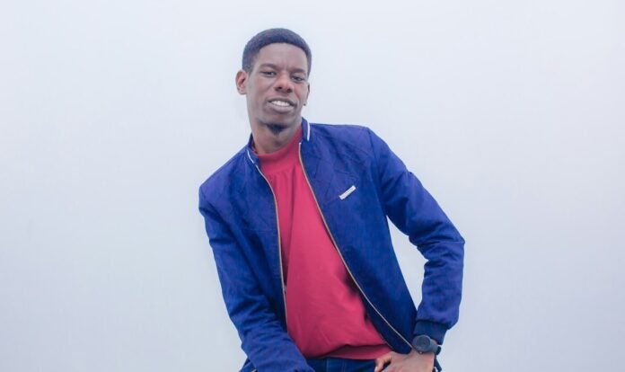 man in red turtleneck shirt and blue jacket
