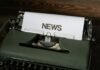 La convergencia entre seguros y seguridad electrónica: un nuevo modelo de protección integral para hogares y negocios a close up of a typewriter with news paper on it